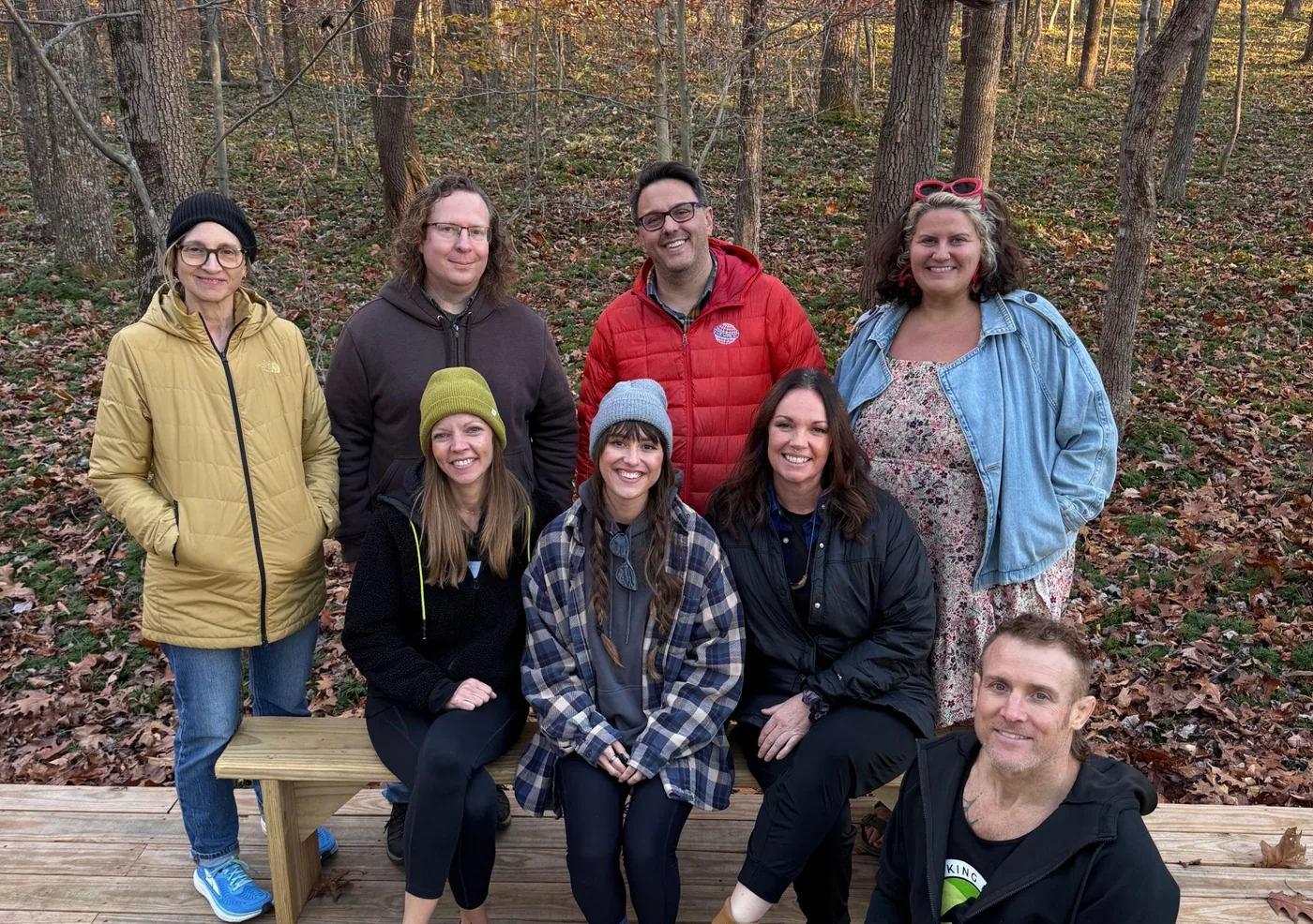 A retreat group gathered together on the forest platform at Raven’s Retreat Hocking Hills
