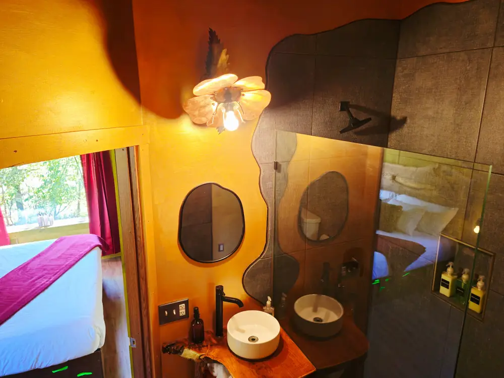 The bathroom in the Art Bungalow with its stone-finished shower