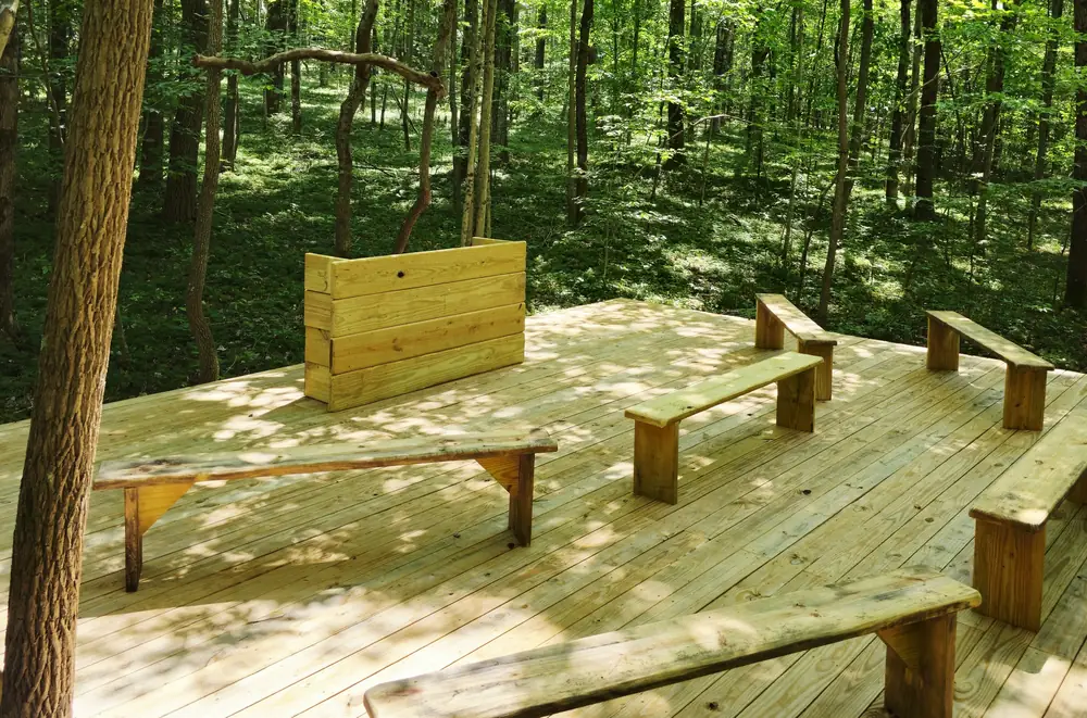 Team retreat meeting spot forest platform on wellness trail at Raven’s Retreat Hocking Hills