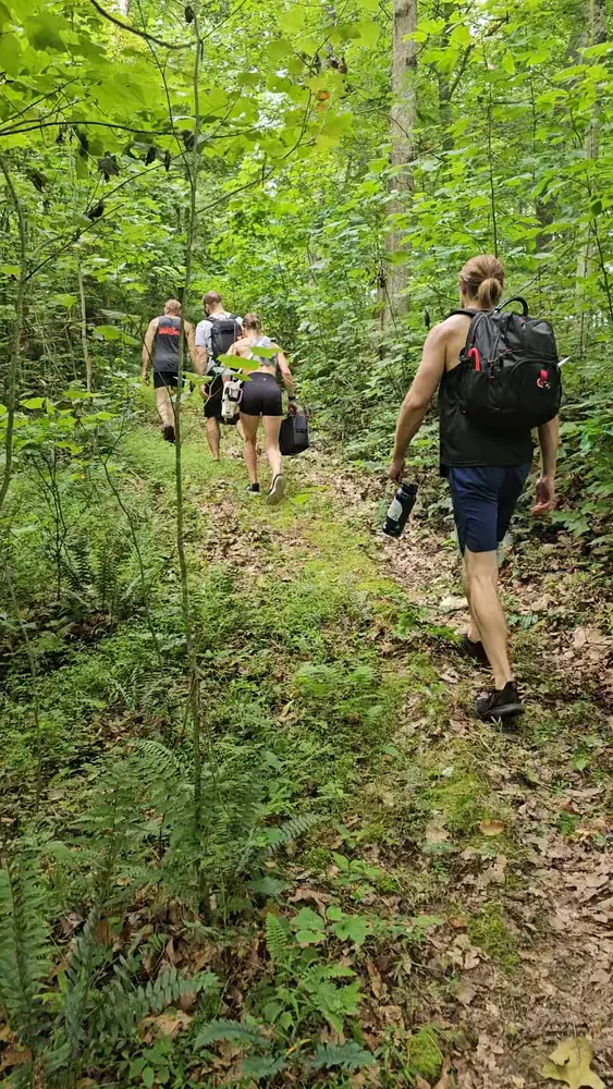 Hiking on wellness trail at Raven’s Retreat Hocking Hills