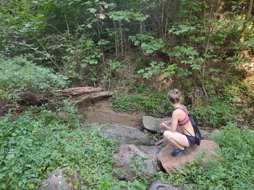 Hiking solo on wellness trail at Raven’s Retreat Hocking Hills