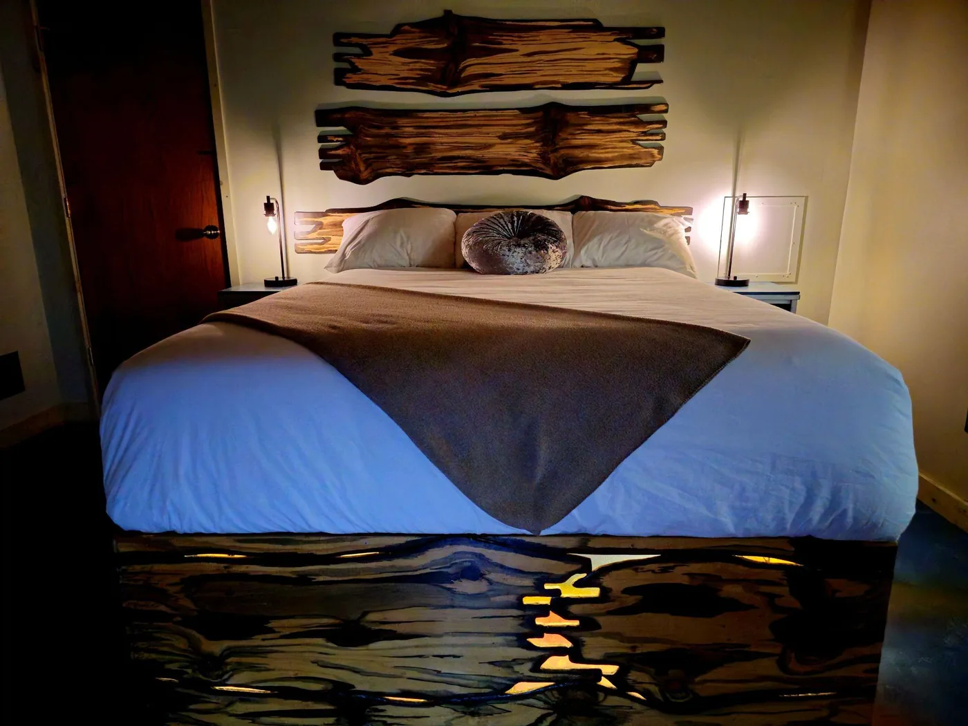 Restful bed for deeper sleep after forest bathing at Raven’s Retreat Hocking Hills