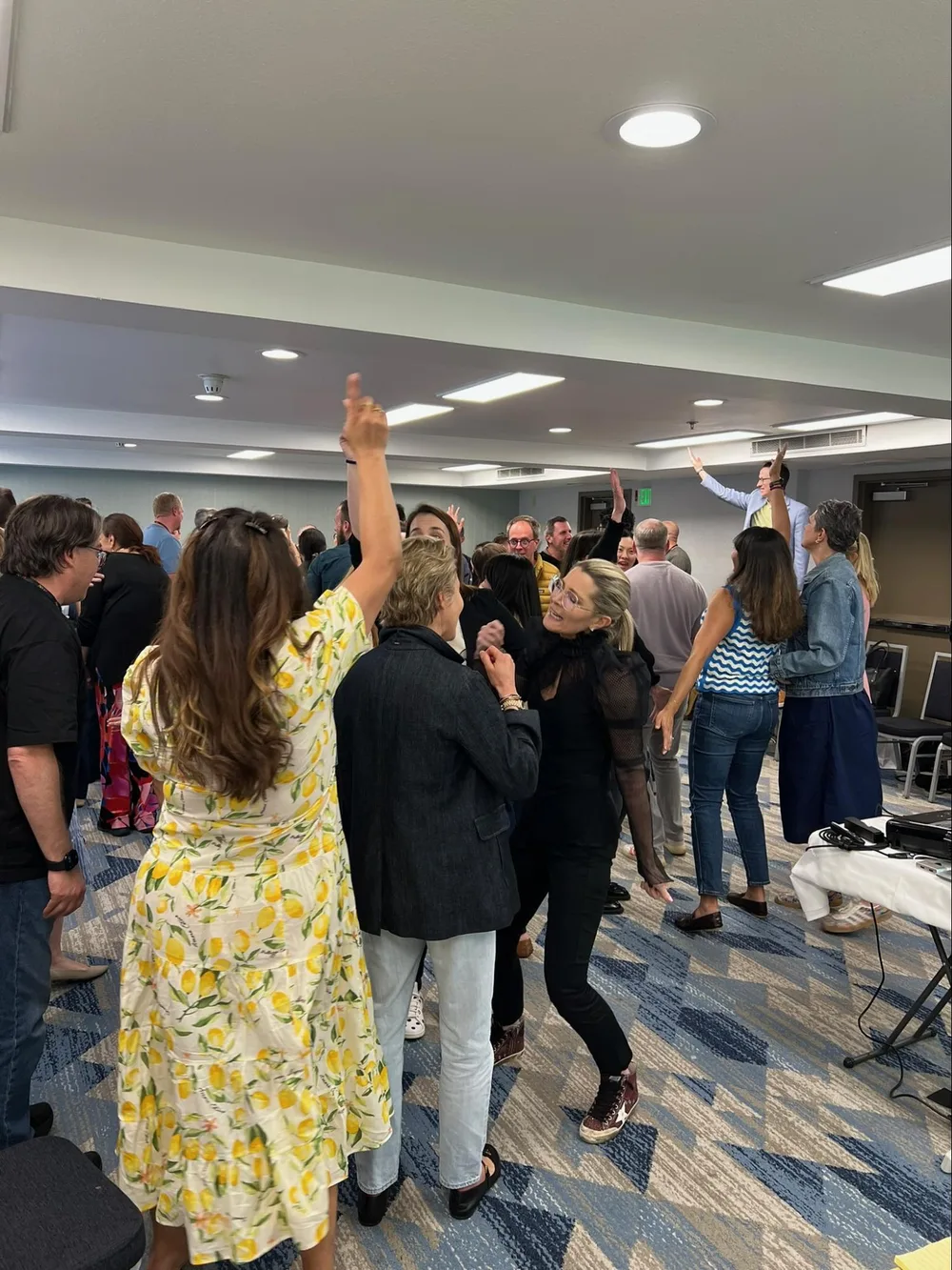 A team mid-exercise during an energetic WitWorks improv workshop