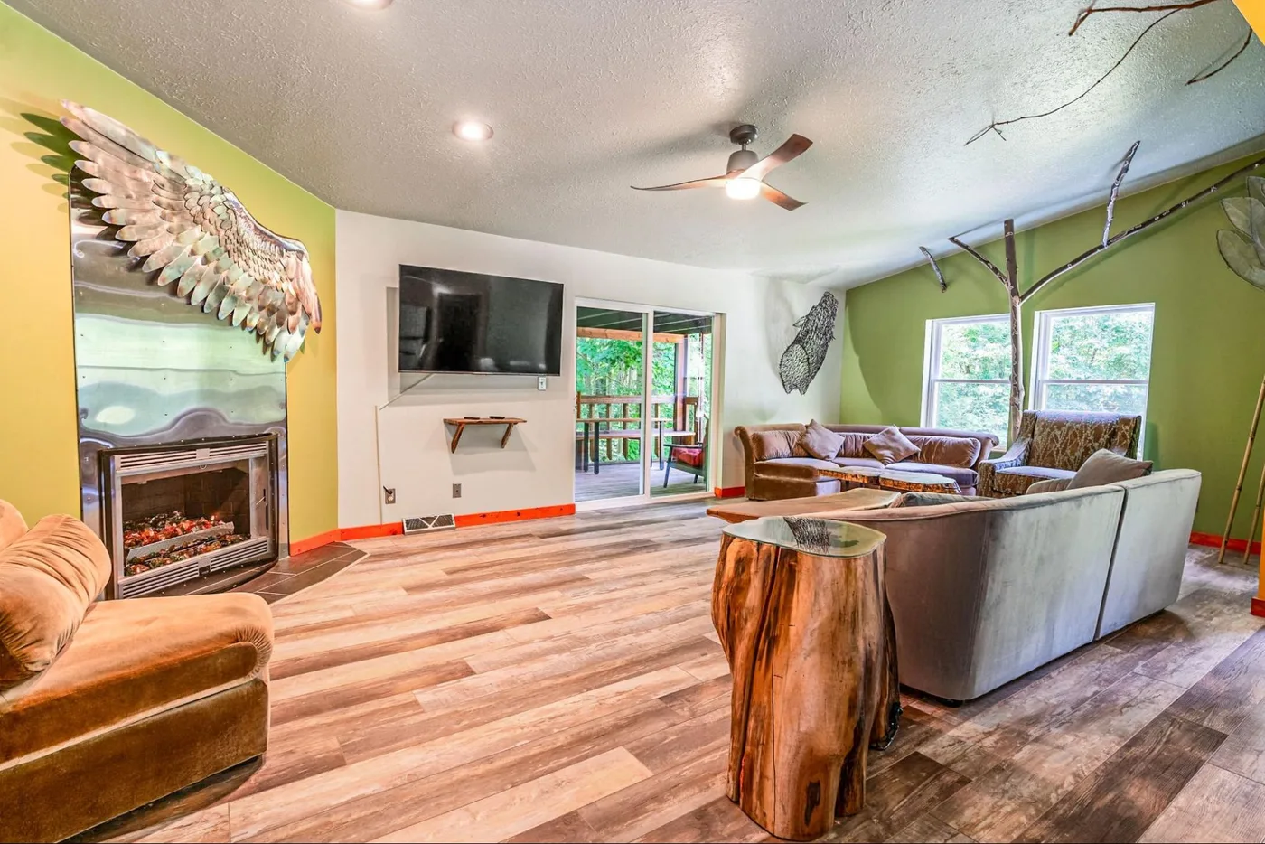 The Art Lodge gathering space with fireplace and handmade wood furniture used for retreat downtime