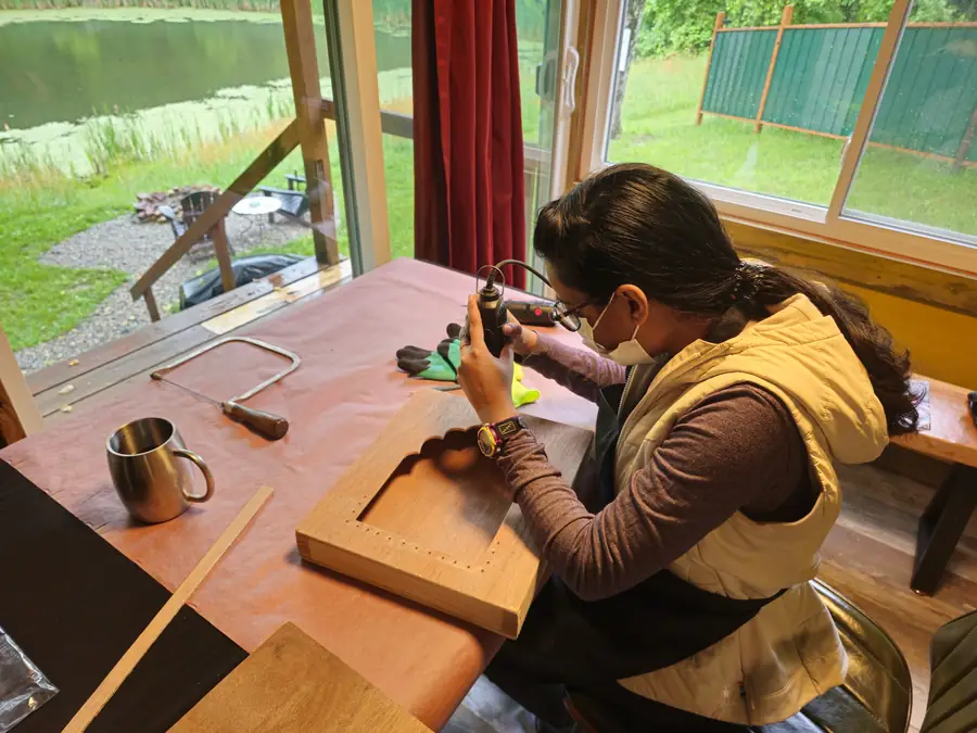 Solo guest working on a sculpture during a private retreat at Raven's Retreat