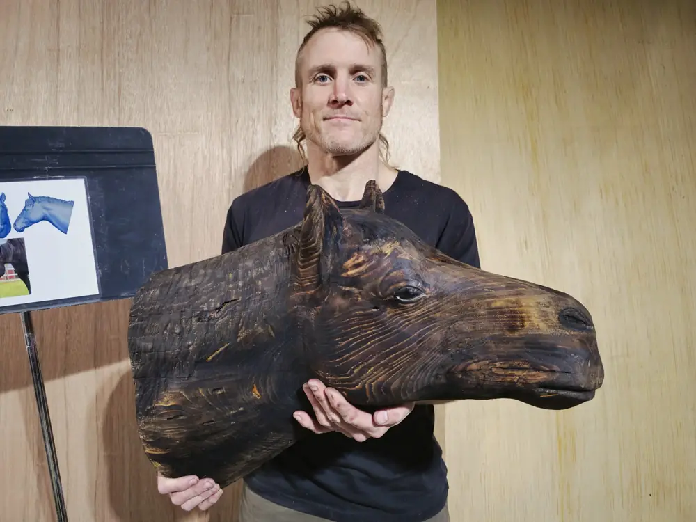 Wood sculpture creation process by Dustin Weatherby he does these performances for guests at Raven’s Retreat Hocking Hills