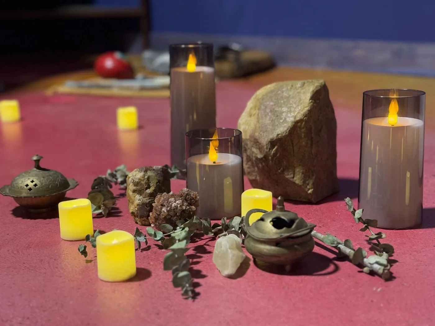 Candles, stones and incense set out for a sound bath at Raven’s Retreat Hocking Hills
