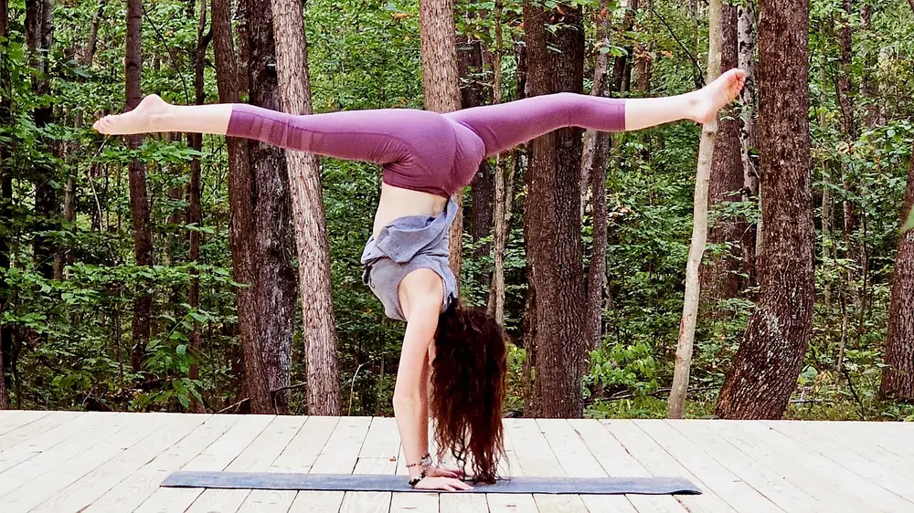 Yoga on forest platform on wellness trail at Raven’s Retreat Hocking Hills