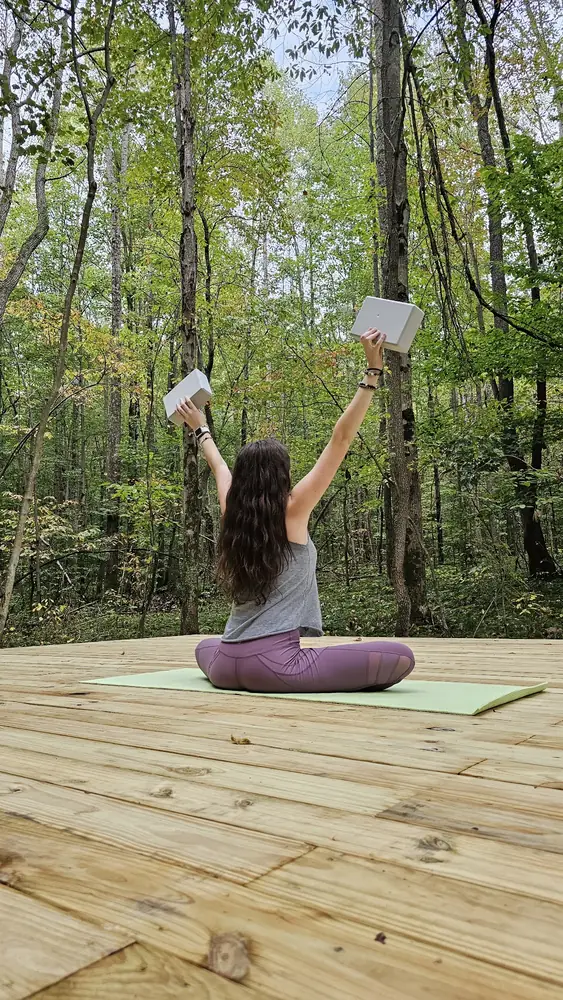 Yoga on forest platform at Raven’s Retreat Hocking Hills